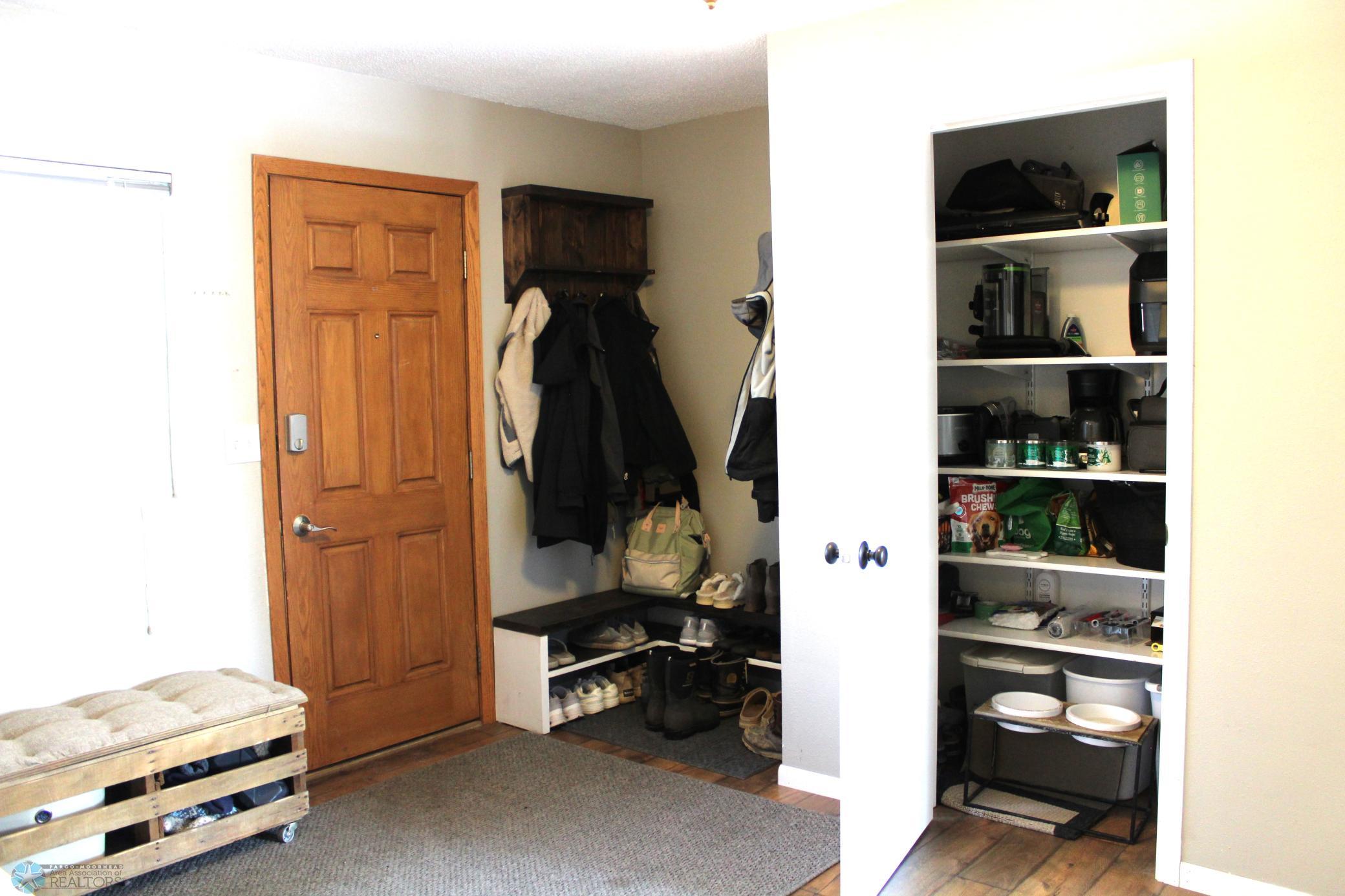 Roomy entry with pantry and drop zone