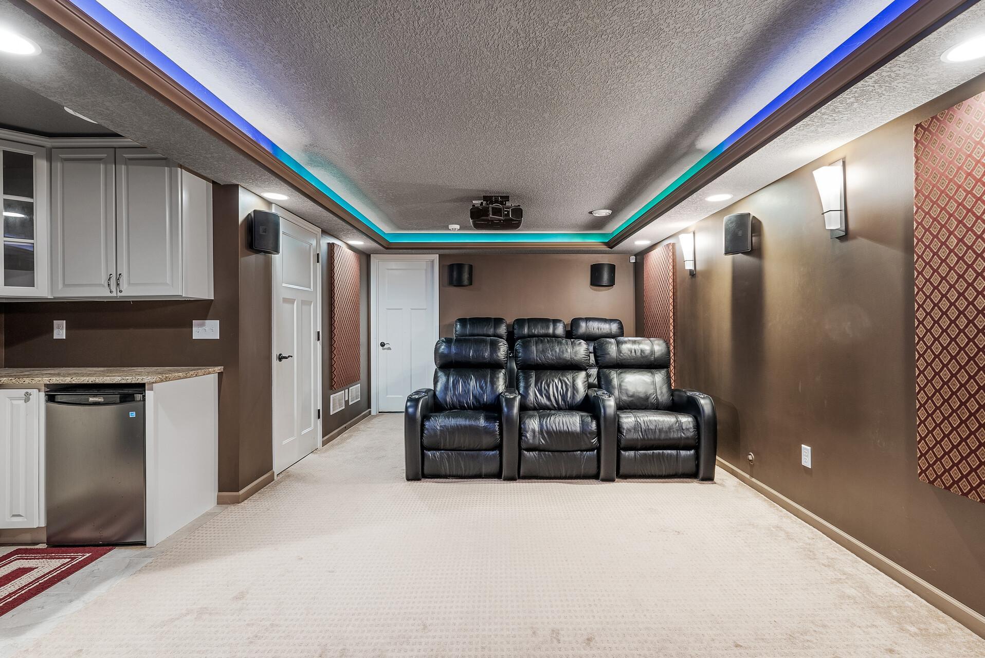 Photo is for illustration only. Chairs/Speakers/Sound panels does not stay with the home.