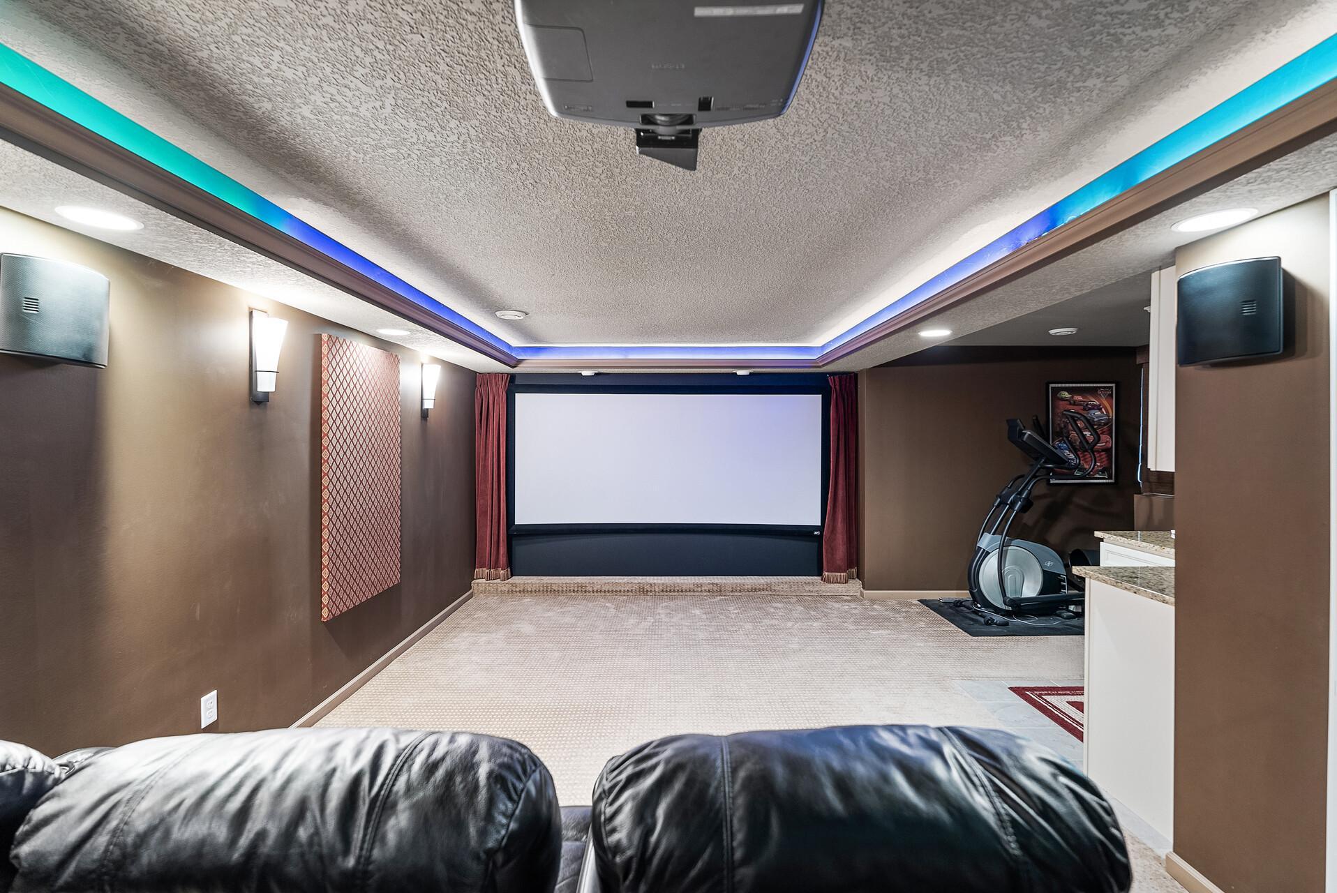 Photo is for illustration only. Chairs/Speakers/Sound panels does not stay with the home.