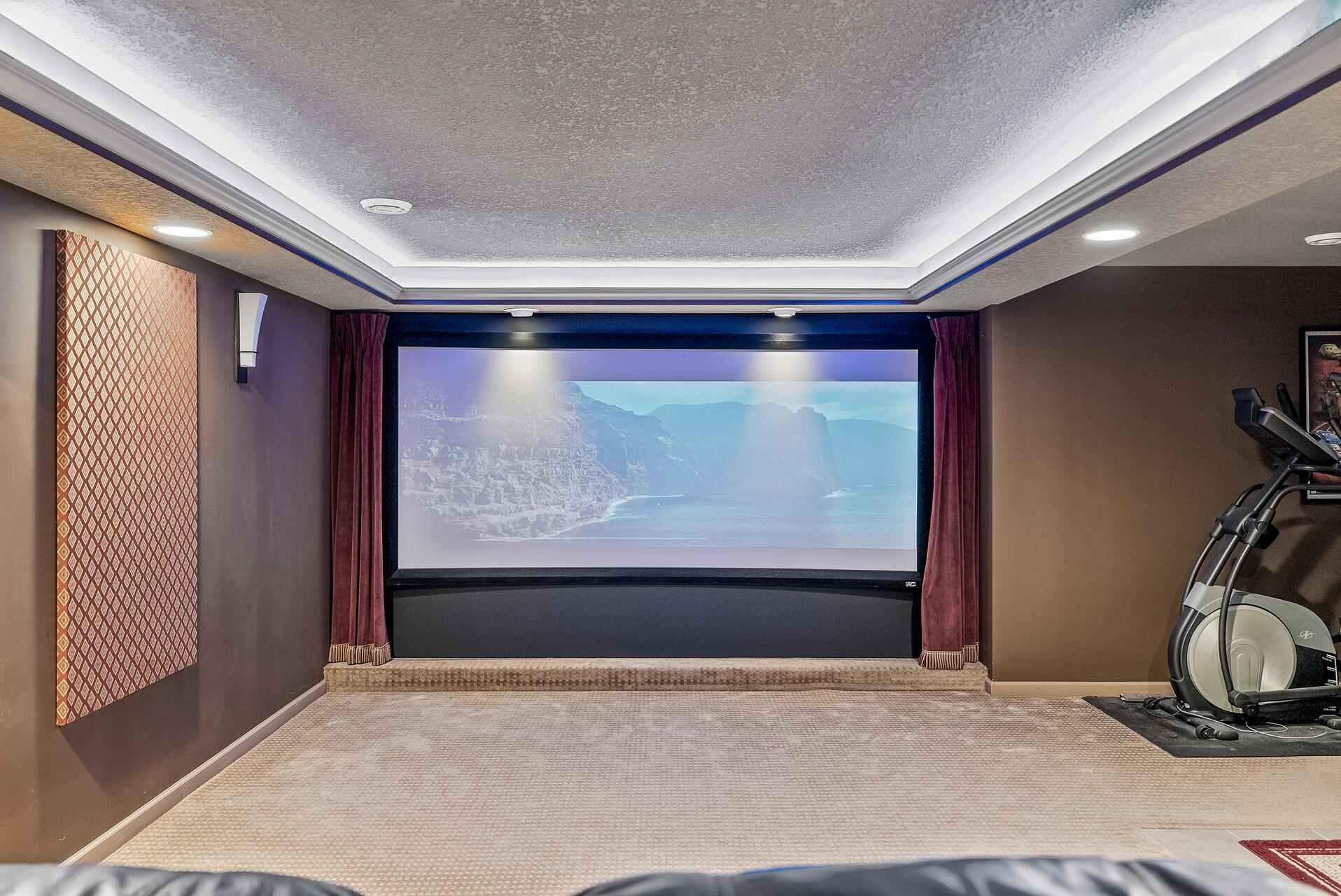 Photo is for illustration only. Chairs/Speakers/Sound panels does not stay with the home.