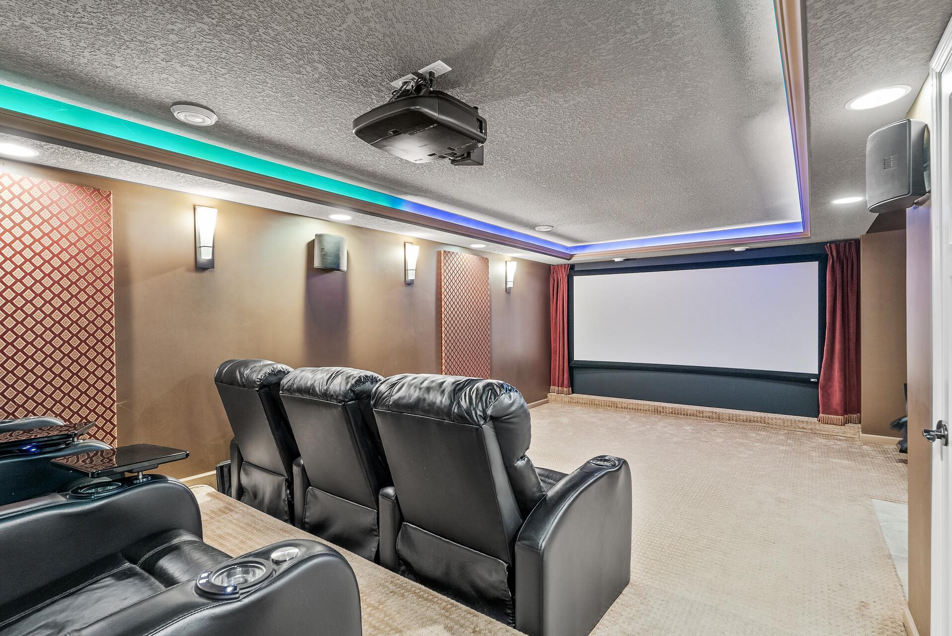 Photo is for illustration only. Chairs/Speakers/Sound panels does not stay with the home.