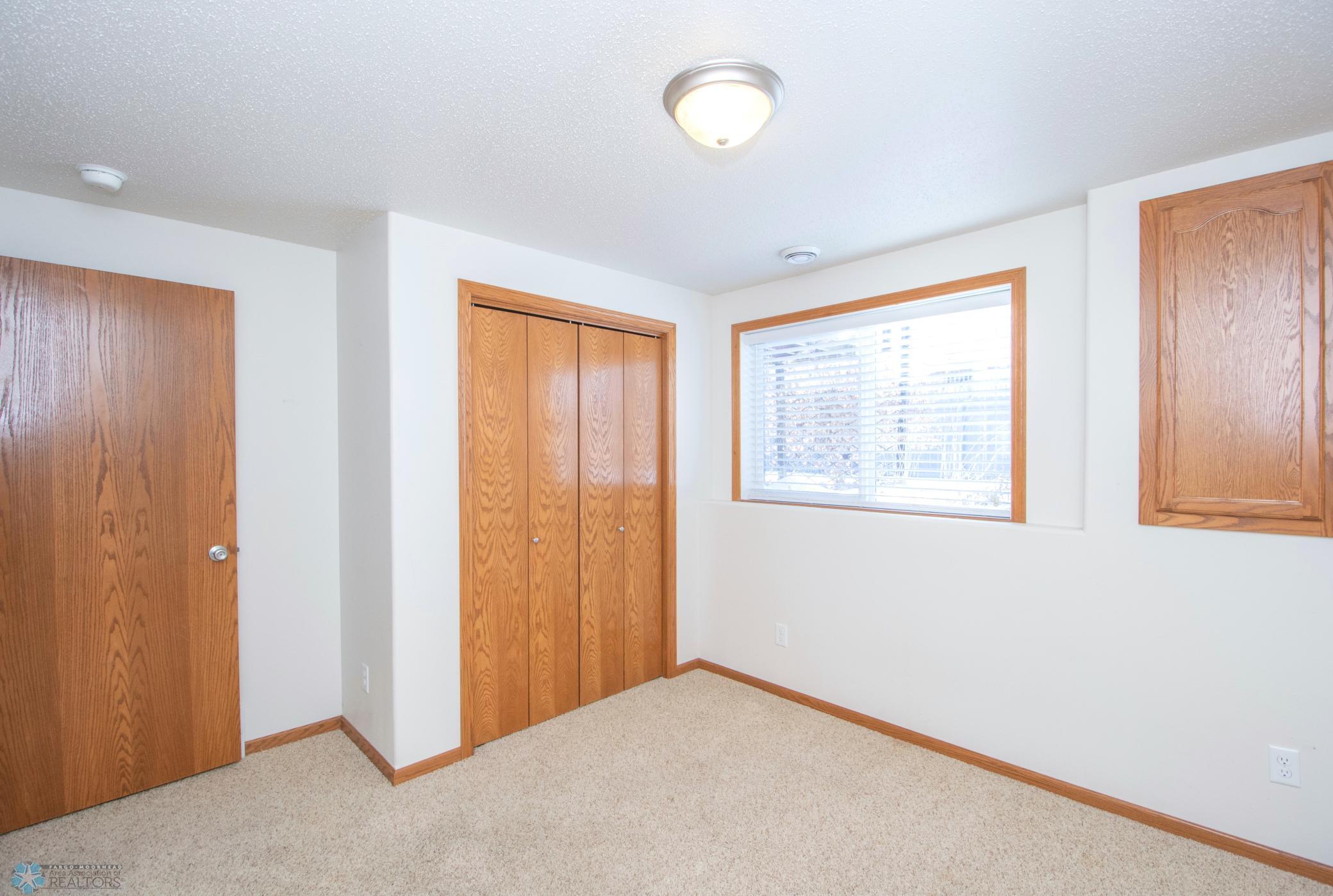 Lower level 3rd bed closet