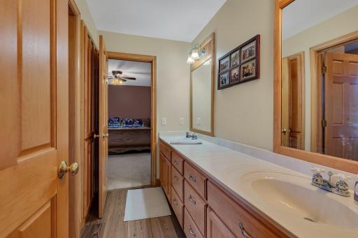 A jack & jill bath with large double vanity creates a nice space between 2 of the upper level bedrooms