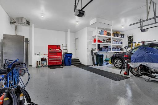 Recently finished epoxy garage floor ~ Insulated and sheet rocked!