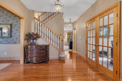 The quiet distinction of this grand entrance space greets your guests while offering a comfortable "welcome home" feel throughout