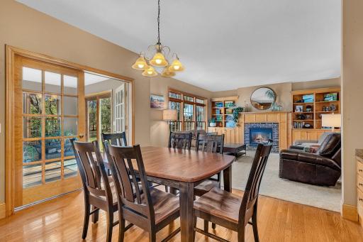 Cozy fireplace in the family room and also in the sun-drenched office beyond the family room!