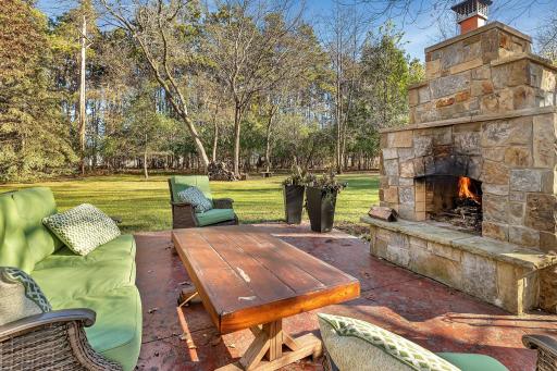 Gather family and friends around the roaring fire and relax in the serenity of a densely wooded & private yard