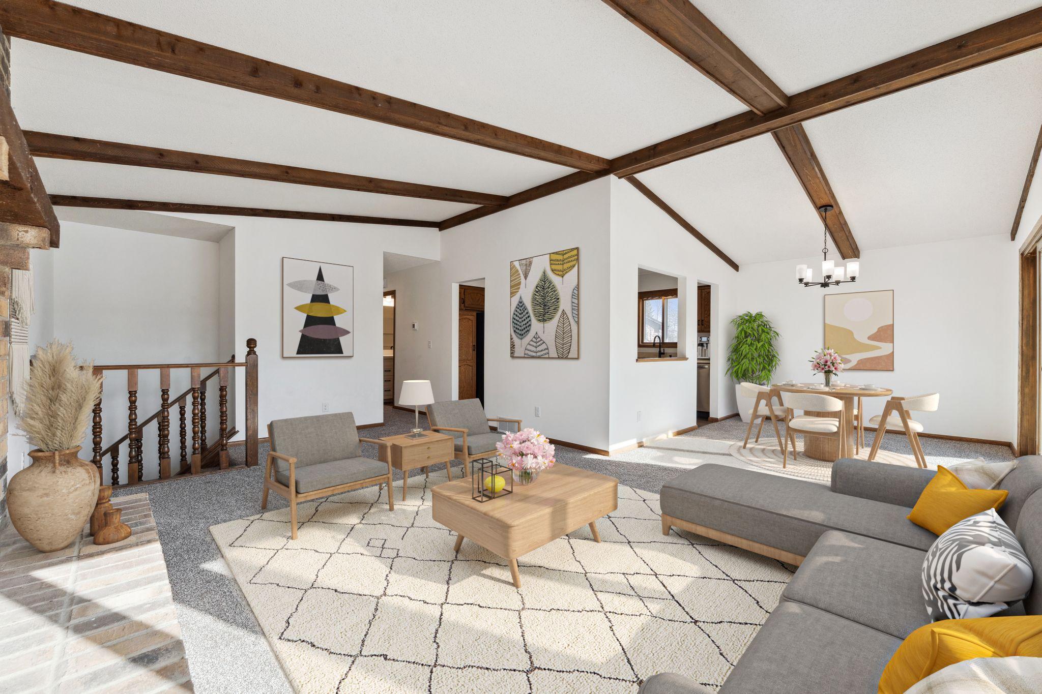 Virtually staged with area rugs. New carpet, lighting and paint.