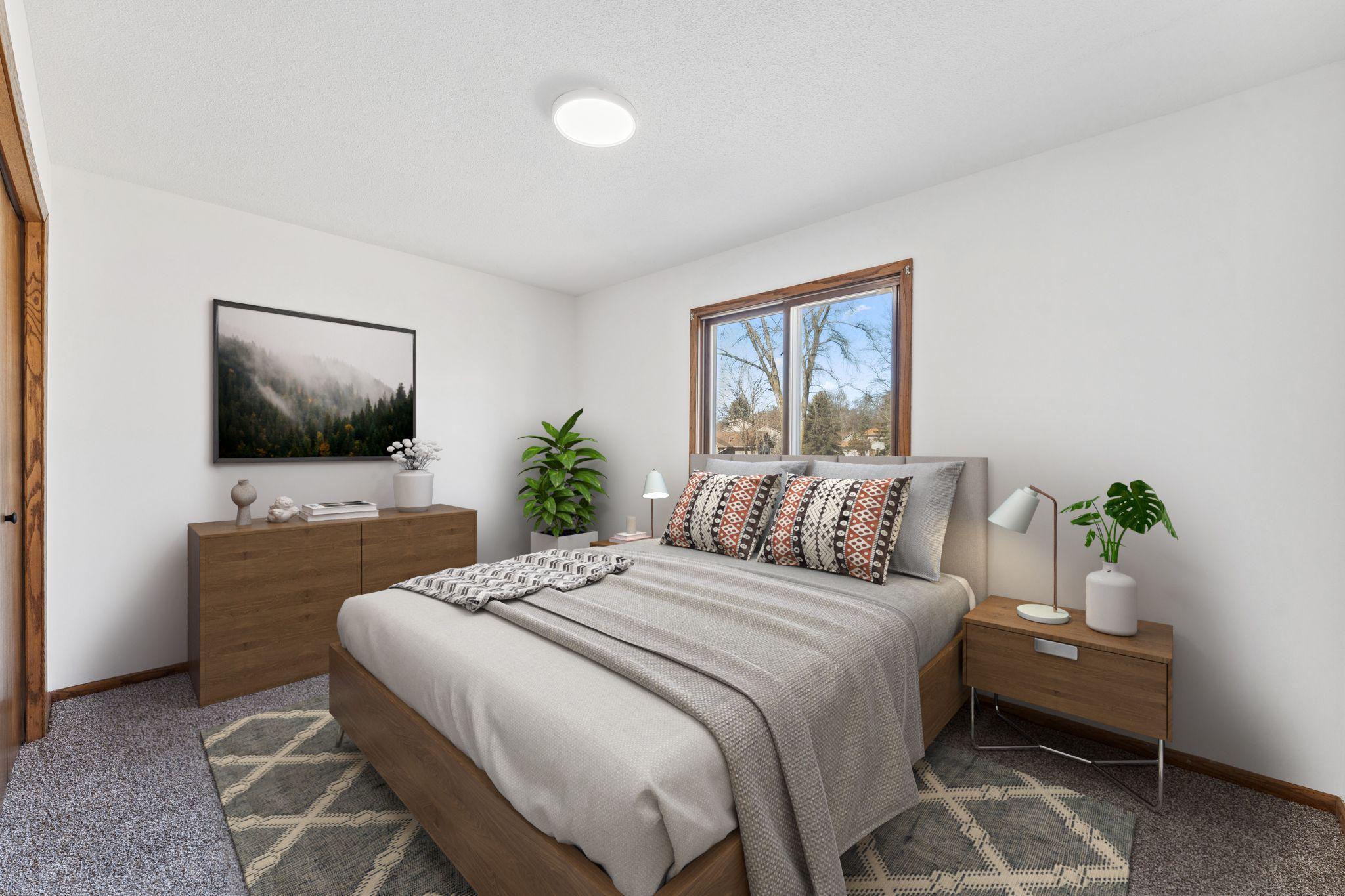 Virtually staged with area rug. Fresh carpet, lighting and paint.