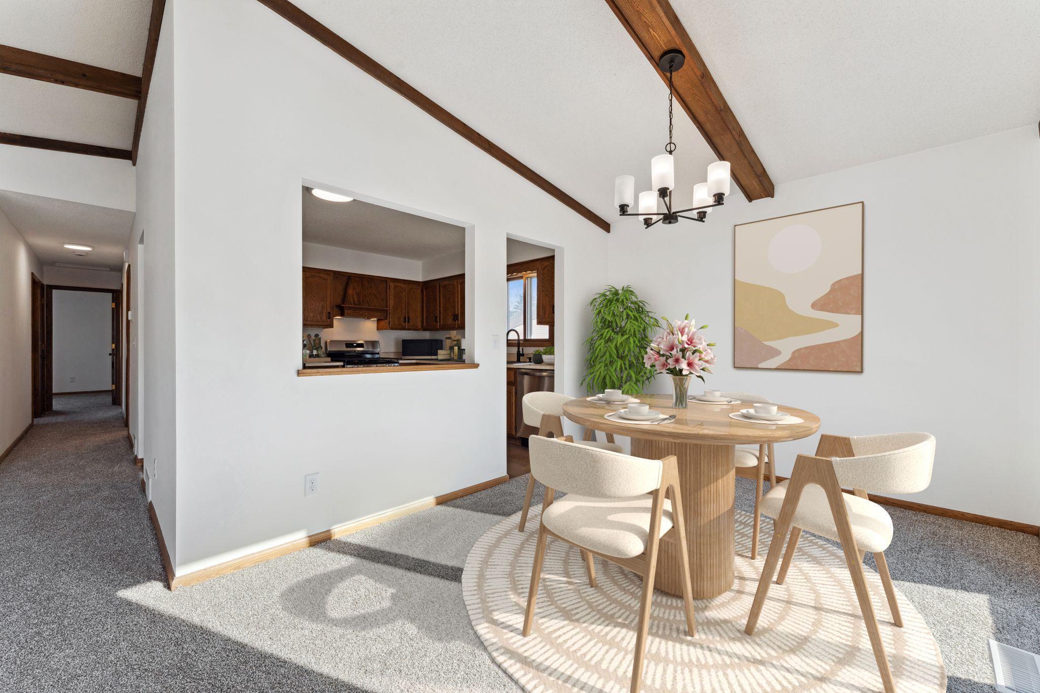 Virtually staged. New carpeting, lighting and paint.