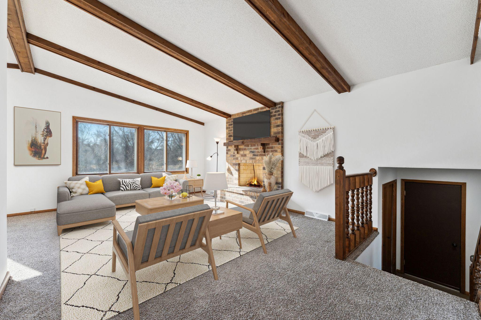 Virtually staged. New carpeting and paint. Fireplace not in use.