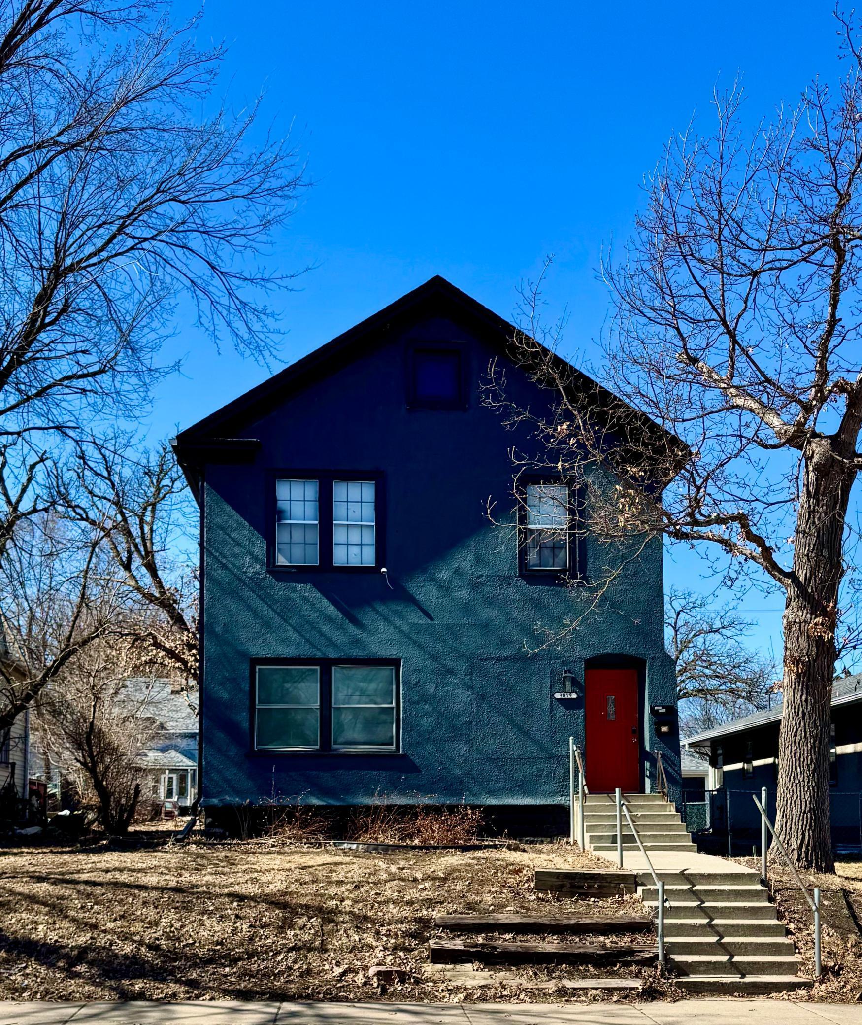 Look at the cute red front door!