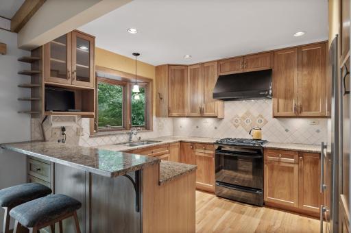 The custom kitchen cabinetry was built and installed by a local craftsman.