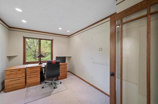 The main floor office has a closet and could be used as a bedroom.