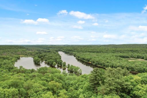 This is the Cedar Bend portion of the St. Croix River which passes along a steep bluff on the western bank with white cedar trees.