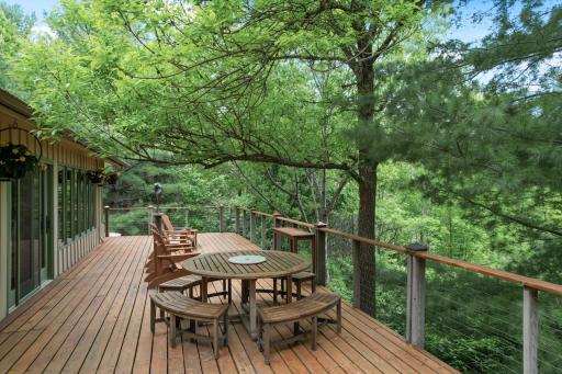 The spacious deck is a fabulous place for gathering a group of friends for drinks.