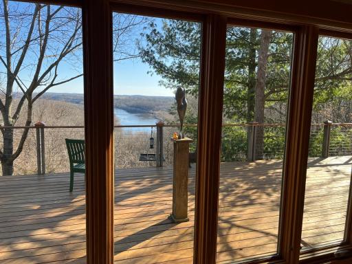Panoramic view from the deck in the spring. Bring your binoculars - this property is a spectacular site for bird-watching.