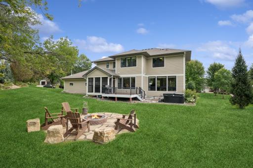 Your outside oasis awaits with lush landscaping.