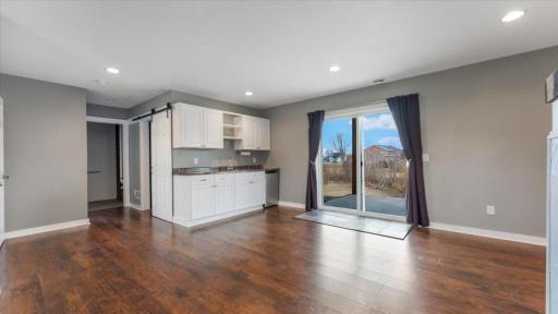 Basement Family Room features wet bar and walkout to 10x14 concrete patio overlooking backyard.