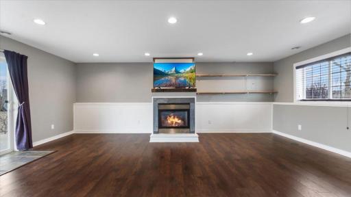 Basement Family Room features gas fireplace.