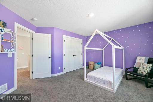 Bedroom with partial walk-in closet