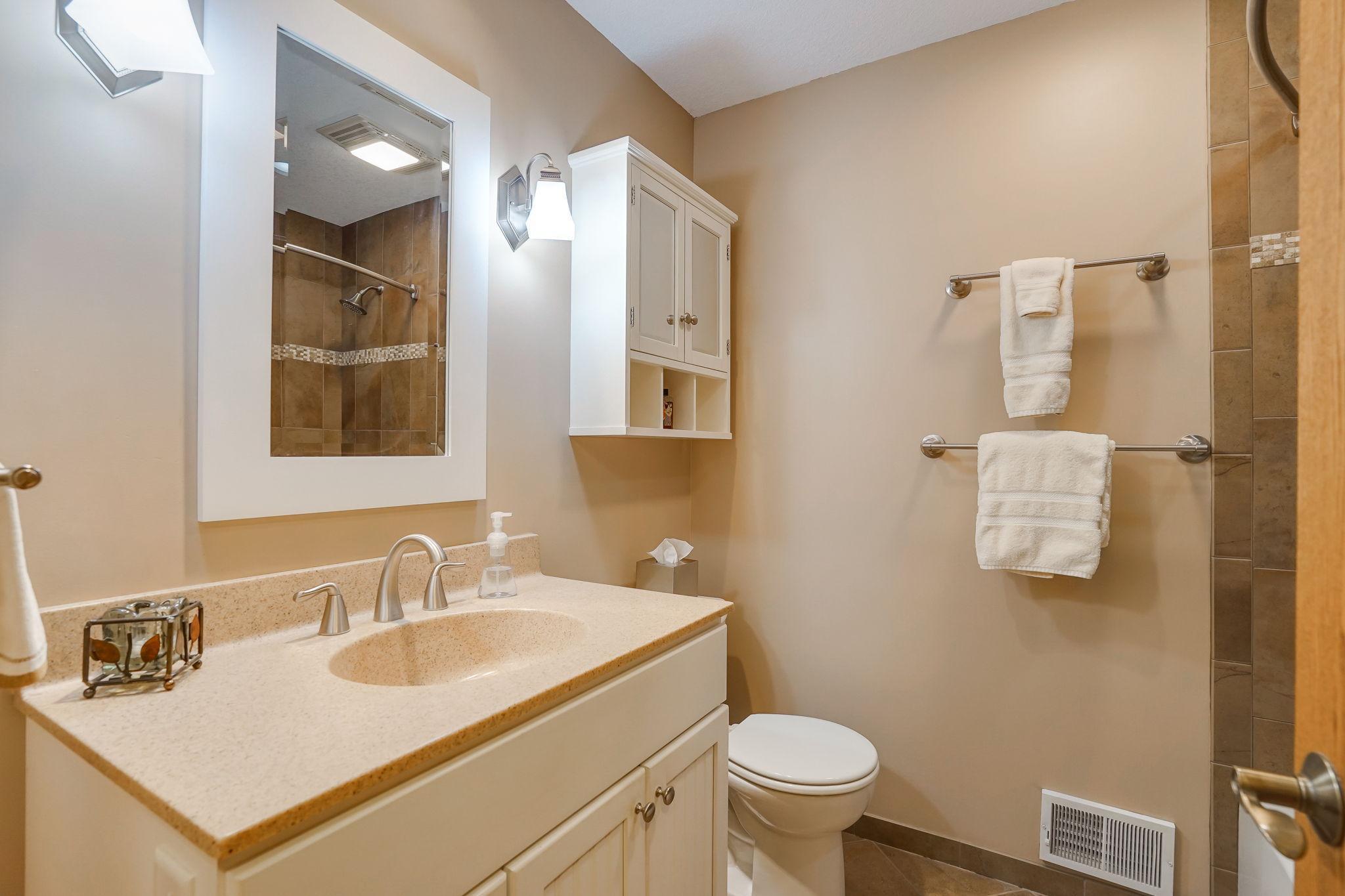 Upated full bath with ceramic tile