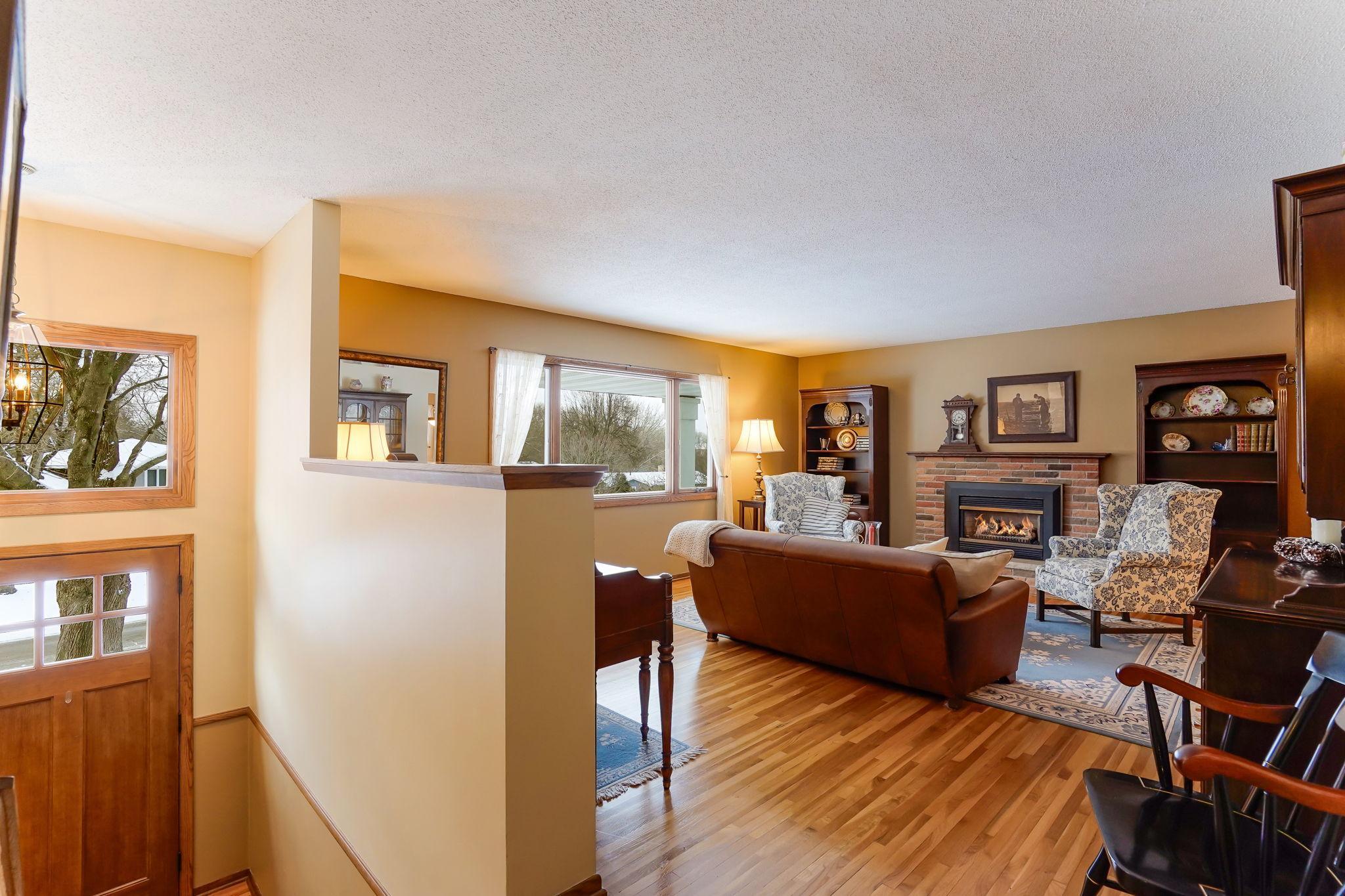 Newer front door, foyer and living room