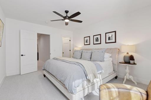 Bedroom #2. Large walk in closet, carpet and ceiling fan