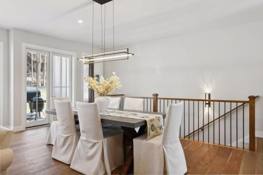 Large dining room easily can seat a table to fit 8-10 people, check out the gorgeous Chandelier.