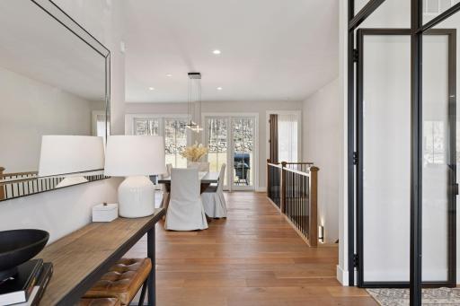 Walk in to this gorgeous home featuring European Oak Engineered hardwood flooring and large Marvin windows allowing for natural light to shine in.