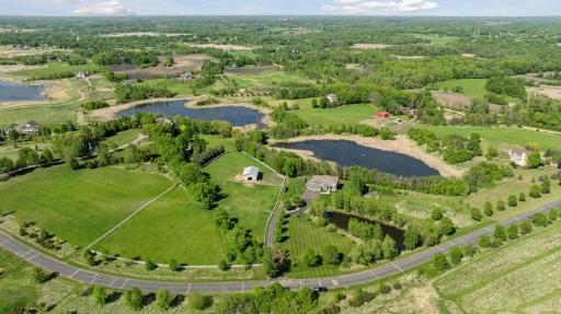 Luxury Retreat at 1410 Preserve Blvd in Minnetrista on 10 sprawling acres of private nature in Deer Creek Preserve. Brand new driveway for next lucky buyer of this beautiful estate.
