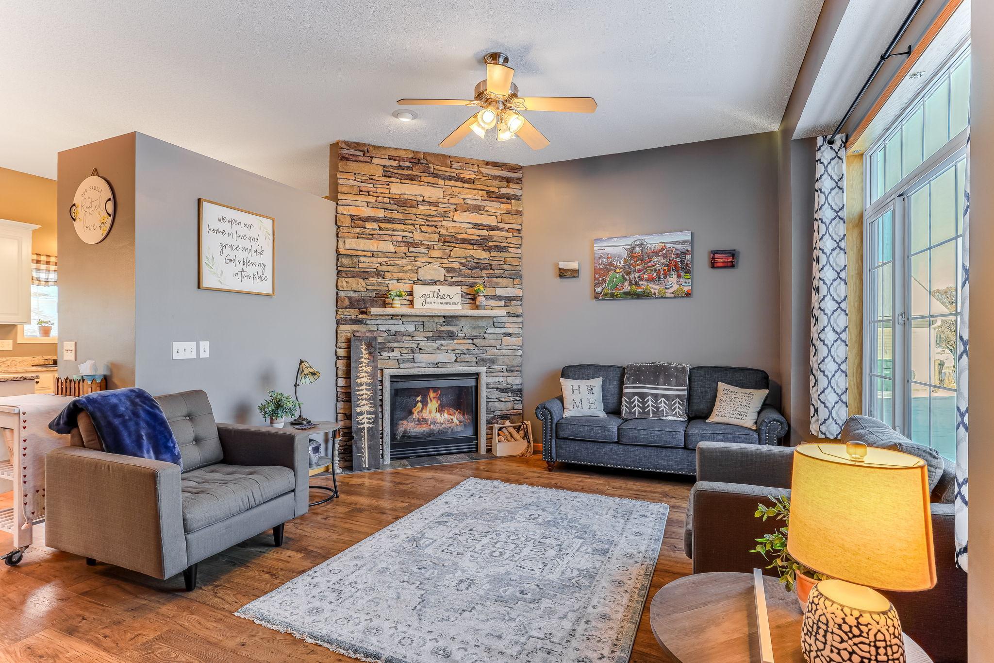 Floor to ceiling brick gar fireplace in front living rm.