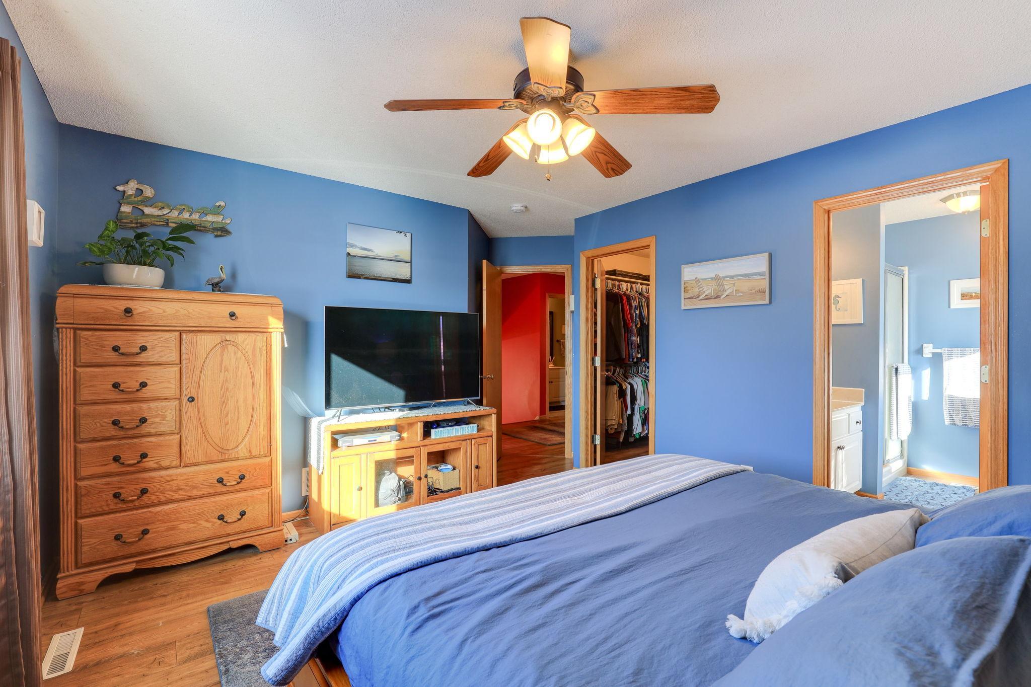 Additional view of primary bedroom, with walk in closet
