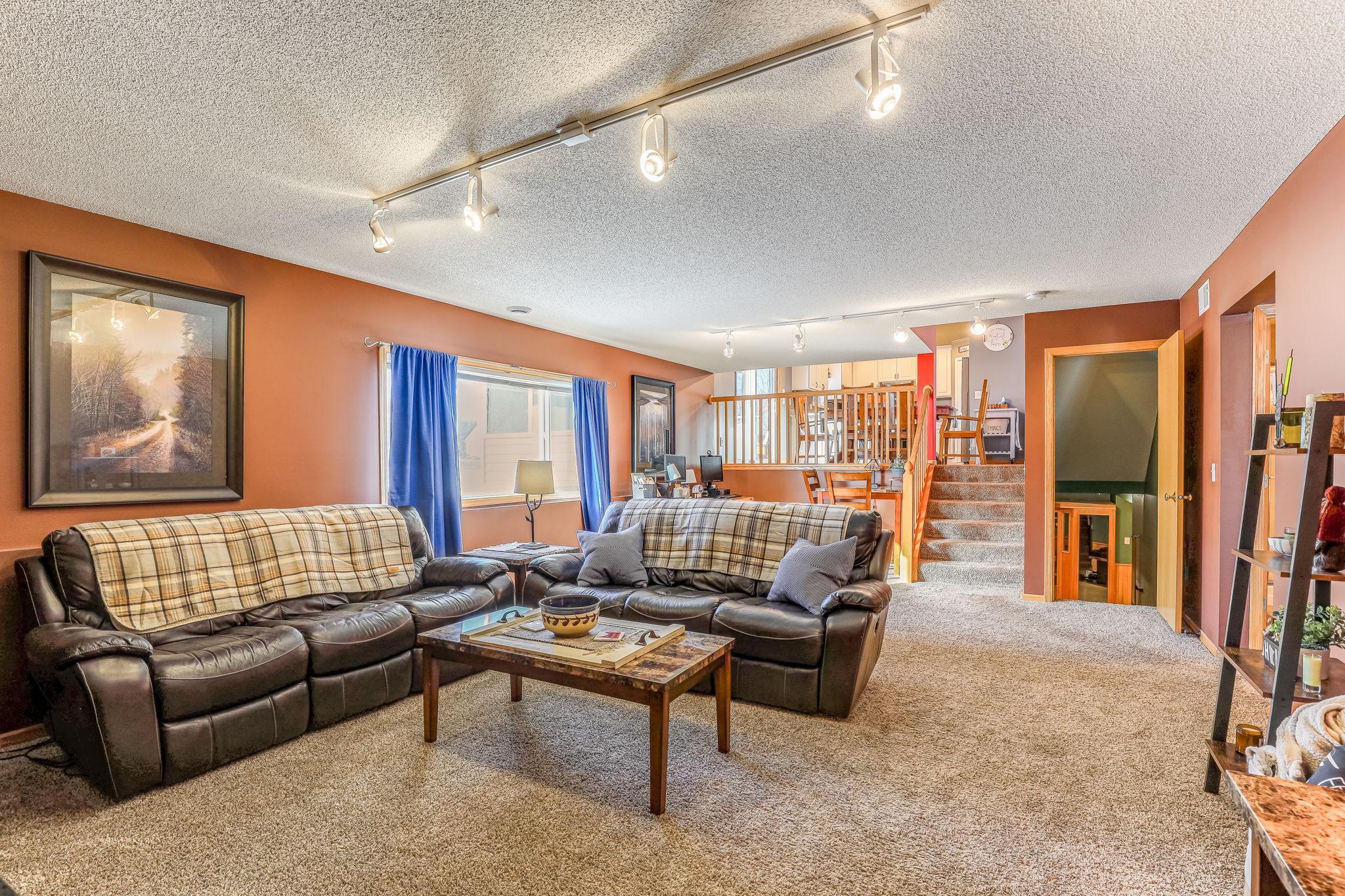 Family room open up from the main floor dining space