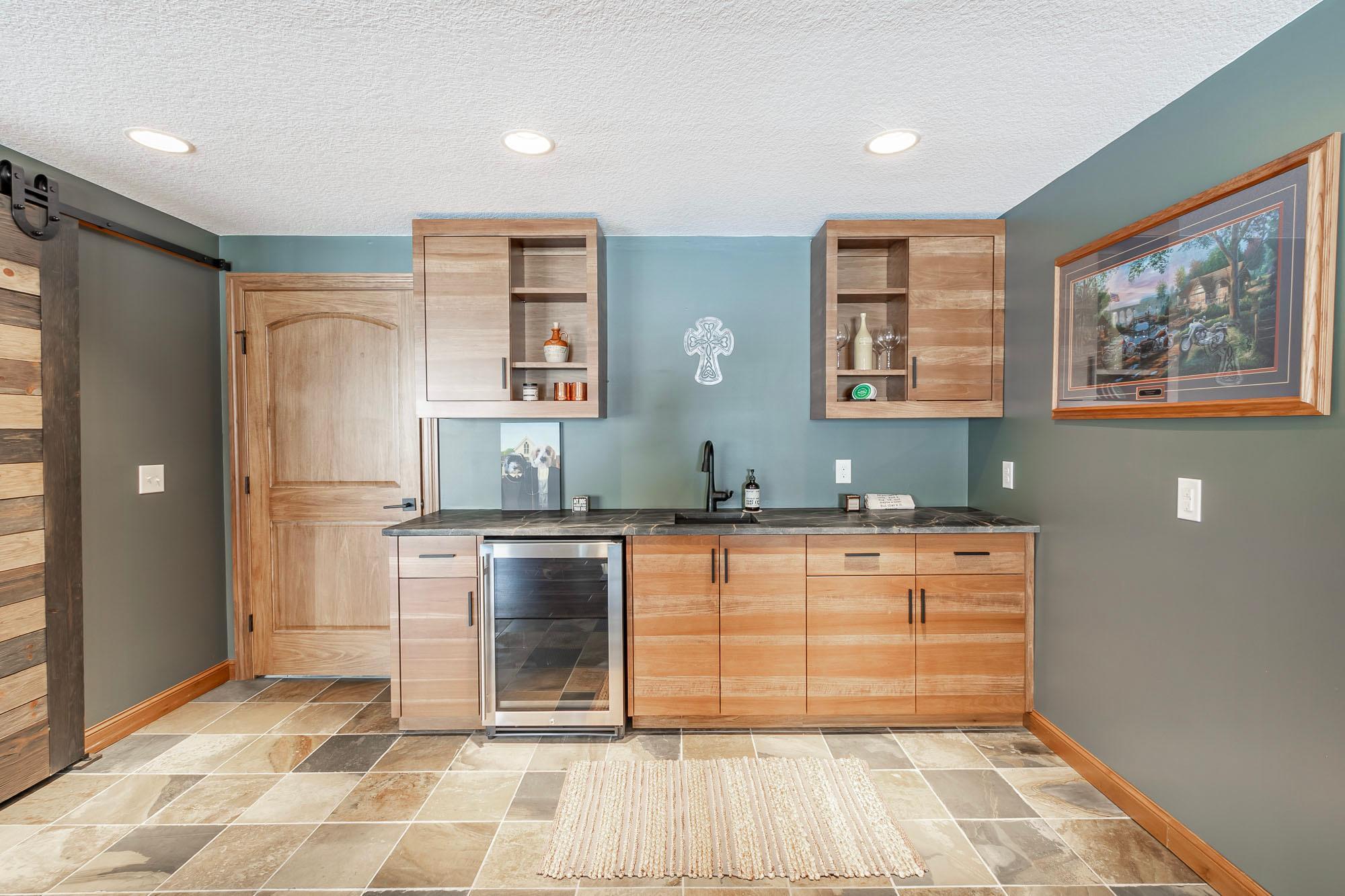 Lower level wet bar with soapstone counters.