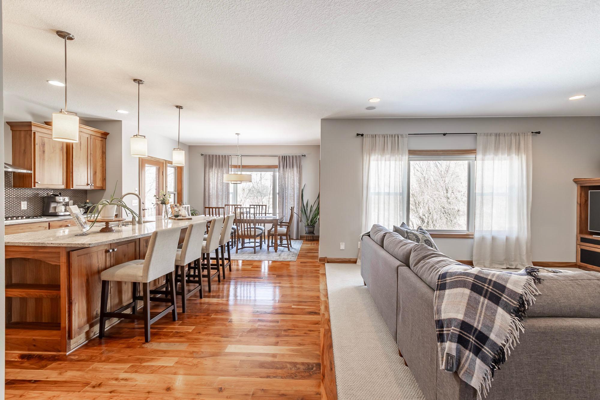 Main level open floor plan with stunning walnut hardwood floors!