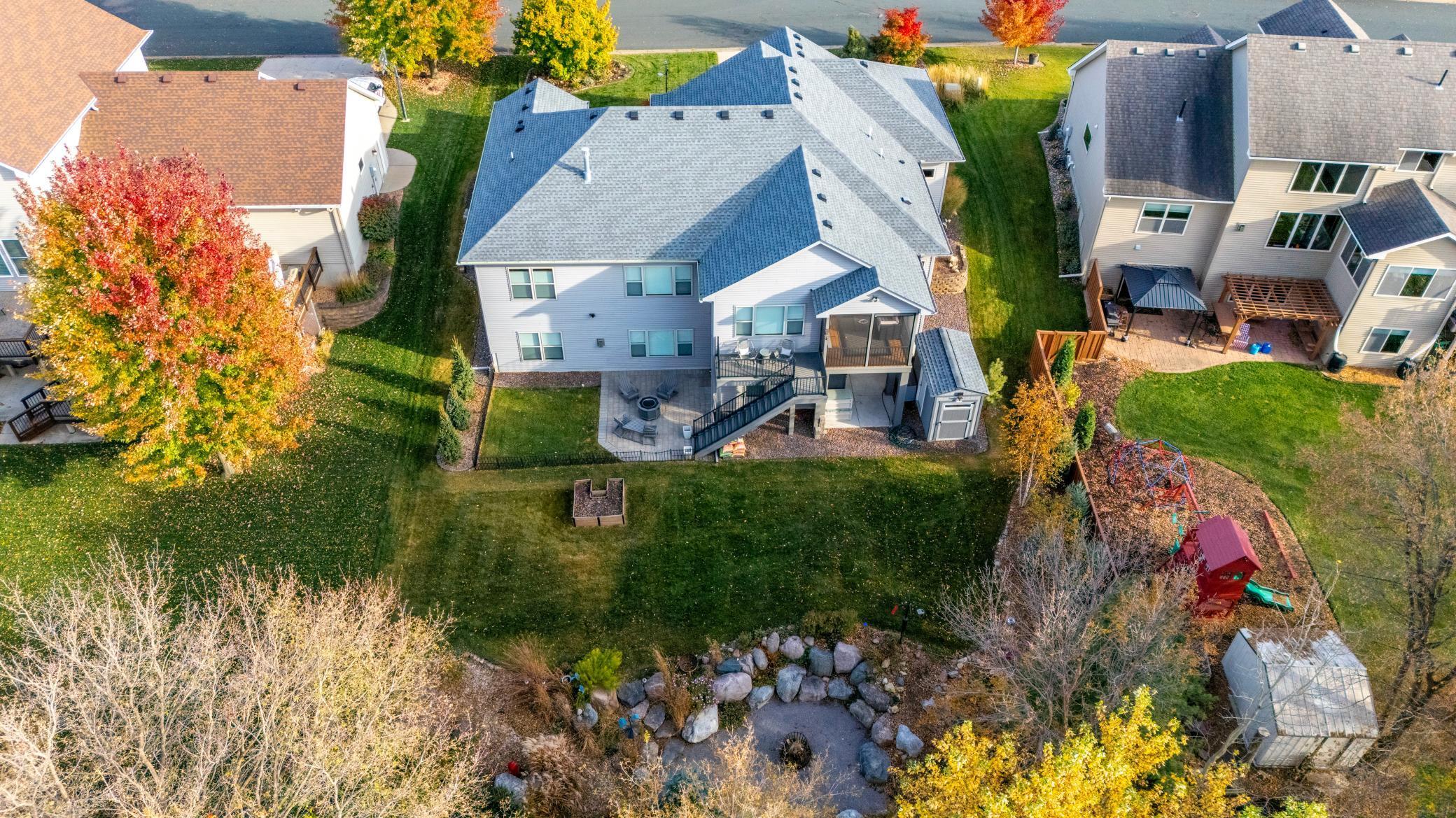 Rear view of home overlooking pond preserve.