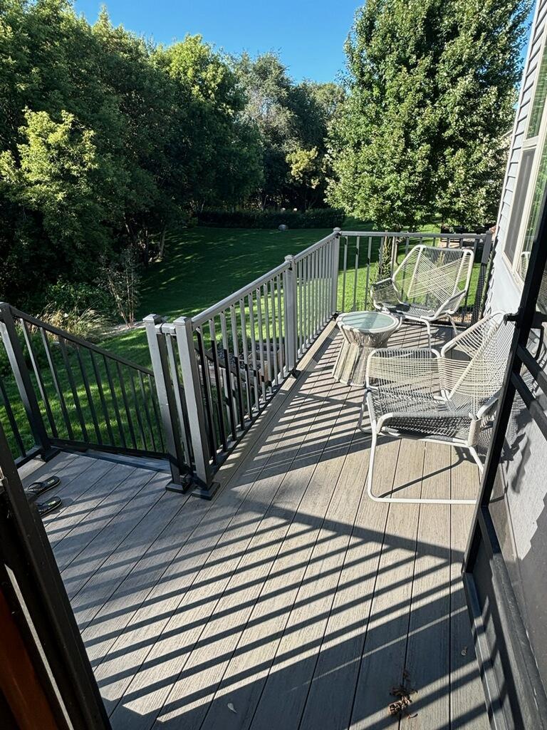 Maintenance free deck over looking pond preserve!
