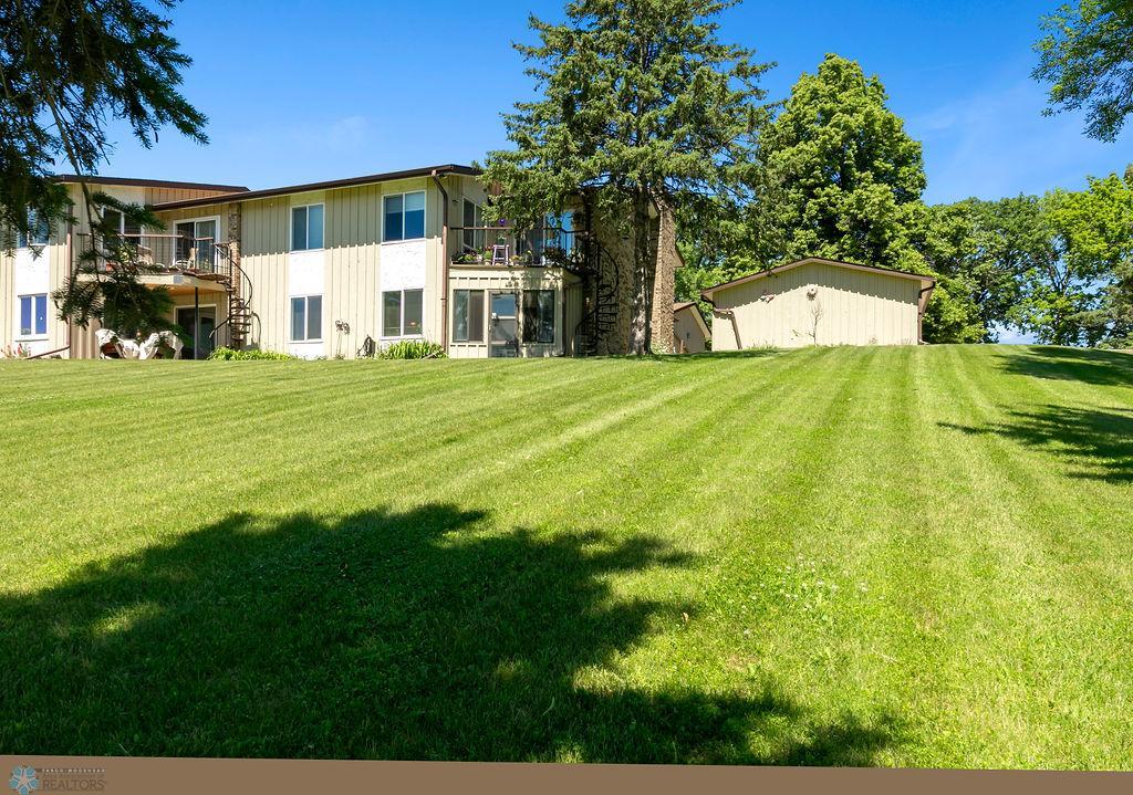 Exterior view to Sunroom & Condo Building
