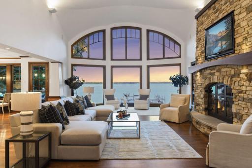 Unwind and enjoy the peaceful ambiance of this living room, surrounded by the beauty of the lake.