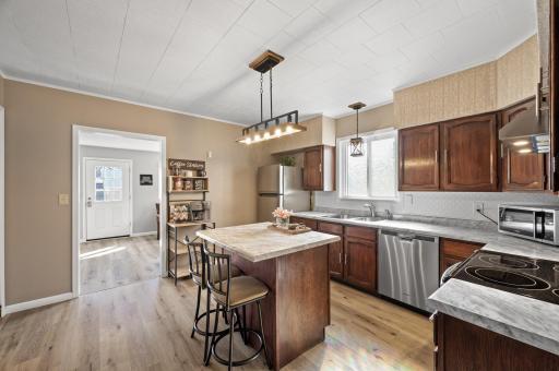 Updated light fixtures and stainless steel appliances