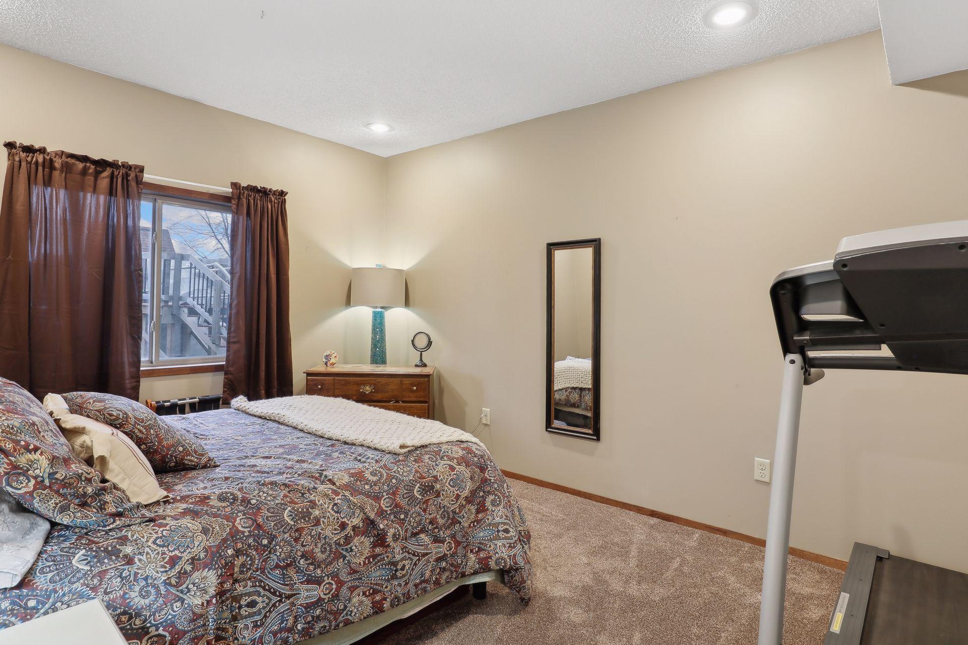 Lower level room being used as a guest room