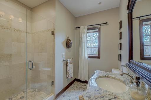 Lower level bath with walk-in shower.