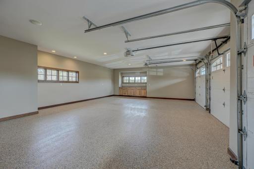 Finished and heated garage with epoxy flooring.