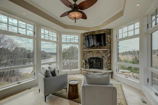 Windows surround the sun room.