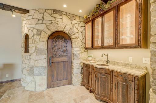 Custom made cabinetry near wine cellar.