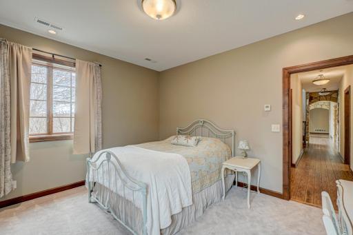 One of three lower level bedrooms, with nice natural light and spacious closets