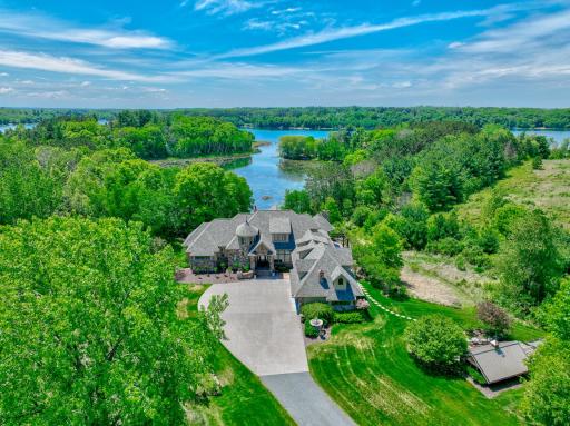 Start creating your legacy in this one of a kind property located on a private bay of Bass Lake.