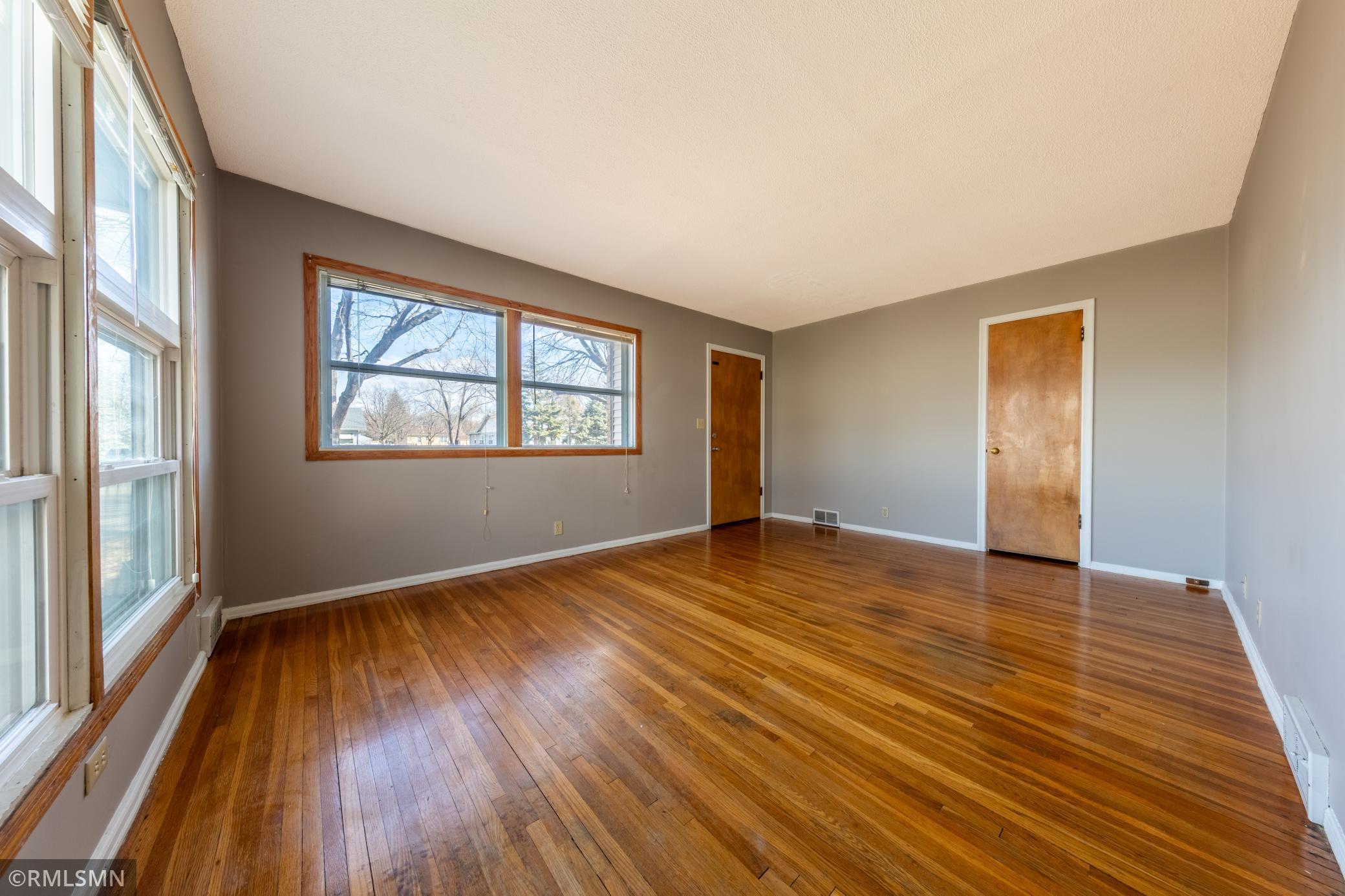 6336 Living room has hardwood floors and recently painted interior