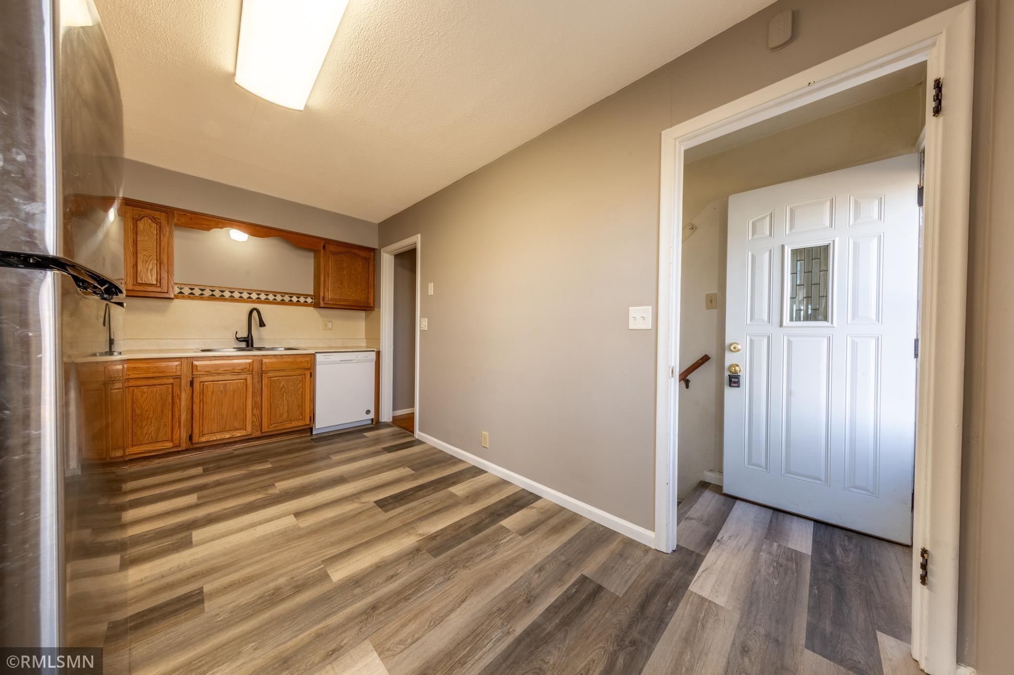 New LVP flooring in kitchen and entry